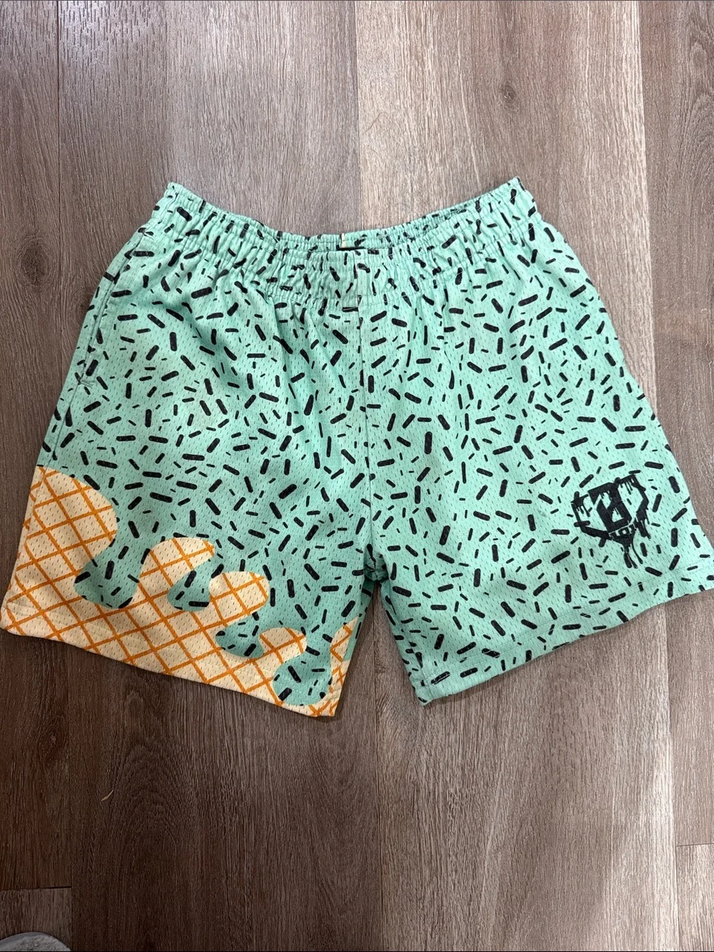 Kids Mint Green Patterned Shorts with Orange Accent